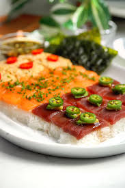 Nigiri and roll platter with tuna, salmon, yellowtail, and shrimp